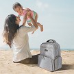 Fashionable backpack converts to diaper bag for years of use! 